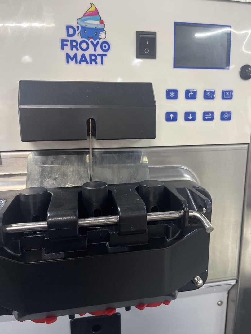 D'Froyo Mart Soft Serve Ice Cream Machine (Category: Industrial Equipment) located in Manila. Submitted by prittielei (Listing ID 1439071094, Image 3). Description: - D'Froyo Mart Soft Serve Ice Cream Machine - Features a digital display - Multiple dispensing nozzles - Constructed with durable stainless steel - Model: 624C D Froyo Mart HSR221779 - Price: ₱79,999.00.