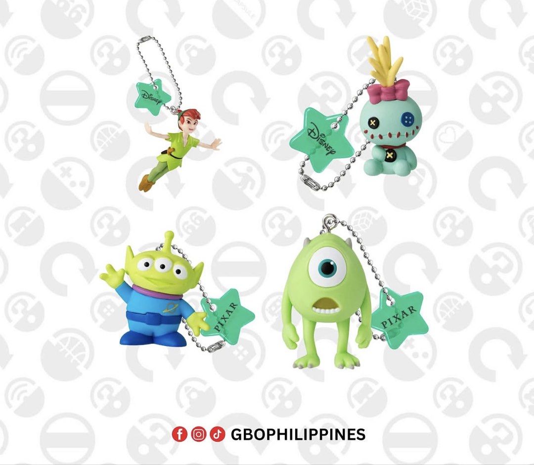Disney Pixar Gashapon Keychain Collection (Category: Character Goods) located in Quezon City. Submitted by gbvilla (Listing ID 1439225835, Image 2). Description: - Disney Pixar keychain set - Features characters: Peter Pan, Mike Wazowski, Stitch, Alien, and others - Includes star-shaped charms - Characters from Toy Story, Monsters Inc., and Peter Pan - From a Gashapon machine.