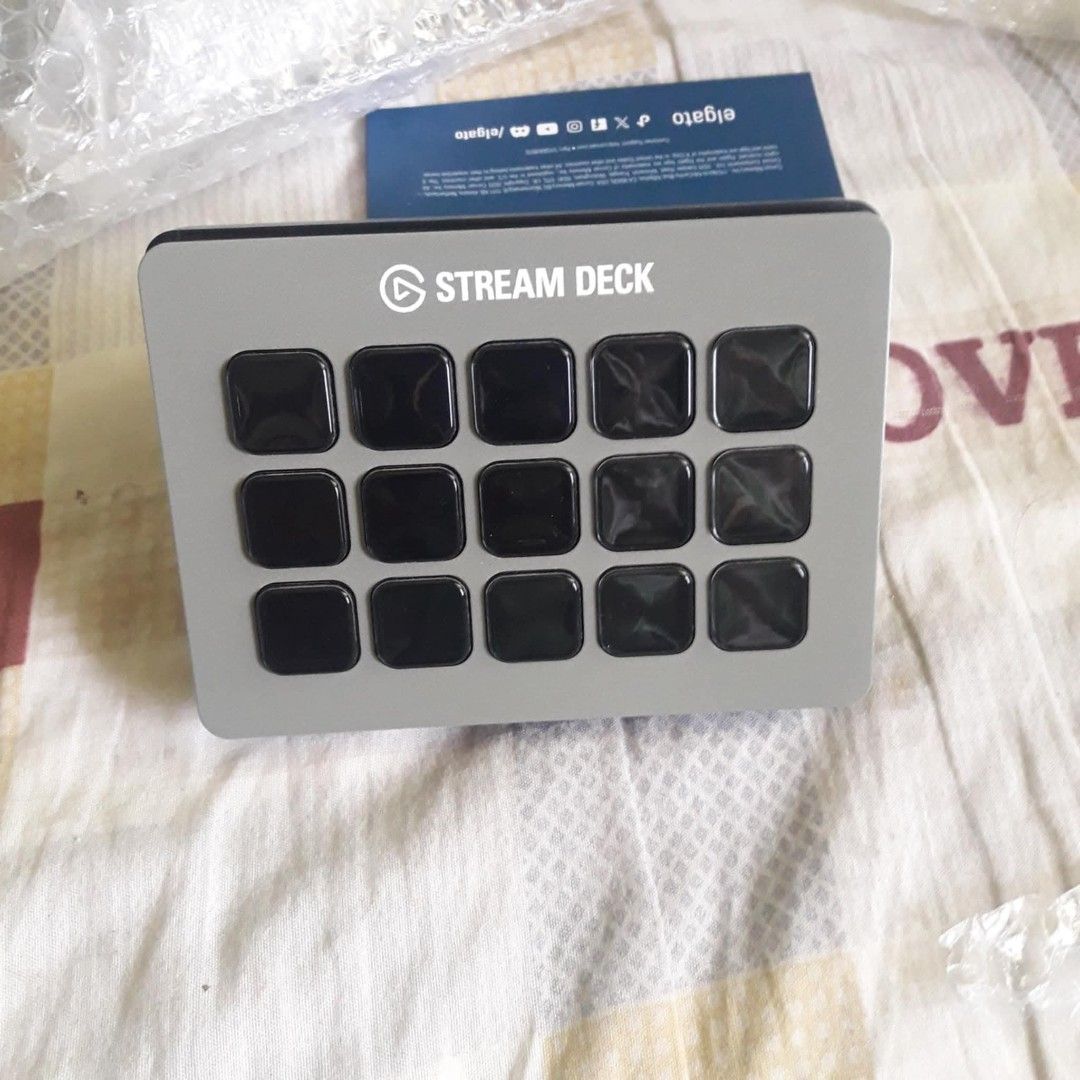 Elgato Stream Deck and Wave 3 Microphone (Category: Other Accessories) located in San Fernando. Submitted by mysticriver_10d80a (Listing ID 1439095994, Image 2). Description: - Elgato Stream Deck with 15 customizable LCD keys. - Elgato Wave 3 microphone included. -army green color - Microphone comes with a base -No cable available -No box included -Stream deck manual only Brand New.