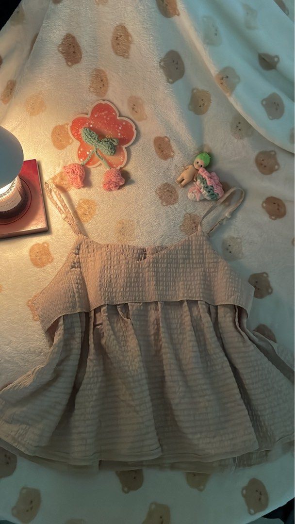 Flowy Beige Top (Category: Sleeveless) located in Makati City. Submitted by kzisdeclutter (Listing ID 1439245768, Image 2). Description: - Beige flowy top - Spaghetti straps - Textured fabric - Layered design - Bought from Hong Kong - Price: ₱399.