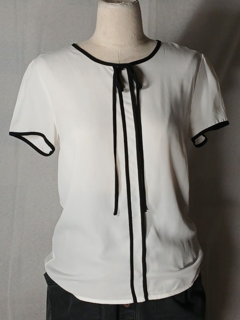Forever 21, white blouse with black details (Category: Blouses) located in Calamba. Submitted by louisa_pons (Listing ID 1439236805, Image 1). Description: Good as new blouse, Small on tag but fits up to Medium. Up for negotiation!🤗❤️.