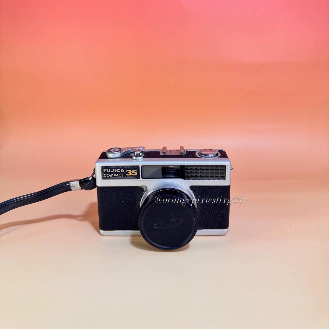 Fujica Compact 35 35mm Film Camera (Category: Cameras) located in Bulacan. Submitted by orangepixiestixgirl (Listing ID 1426268043, Image 1). Description: ‼️message me on ig, @orangepixiestixgirl for inquiries and transactions‼️ ‼️ CAN’T REPLY HERE ‼️ Fujica Compact 35 35mm Film Camera —fujinon 38mm f/2.8 lens and a selenium light meter for automatic exposure control. —camera uses zone focusing, with focus icons visible in the viewfinder, and sup