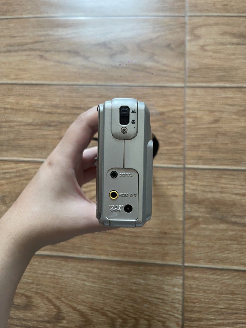 Fujifilm DX-8 Digital Camera 1998 (Category: Cameras) located in San Pablo. Submitted by teenagegrrlgang (Listing ID 1439129074, Image 2). Description: - Fujifilm FinePix DX-8 digital camera - Silver color - Built-in flash - Digital and video out ports - Uses AA batteries - Includes wrist strap - Screen shows some wear .