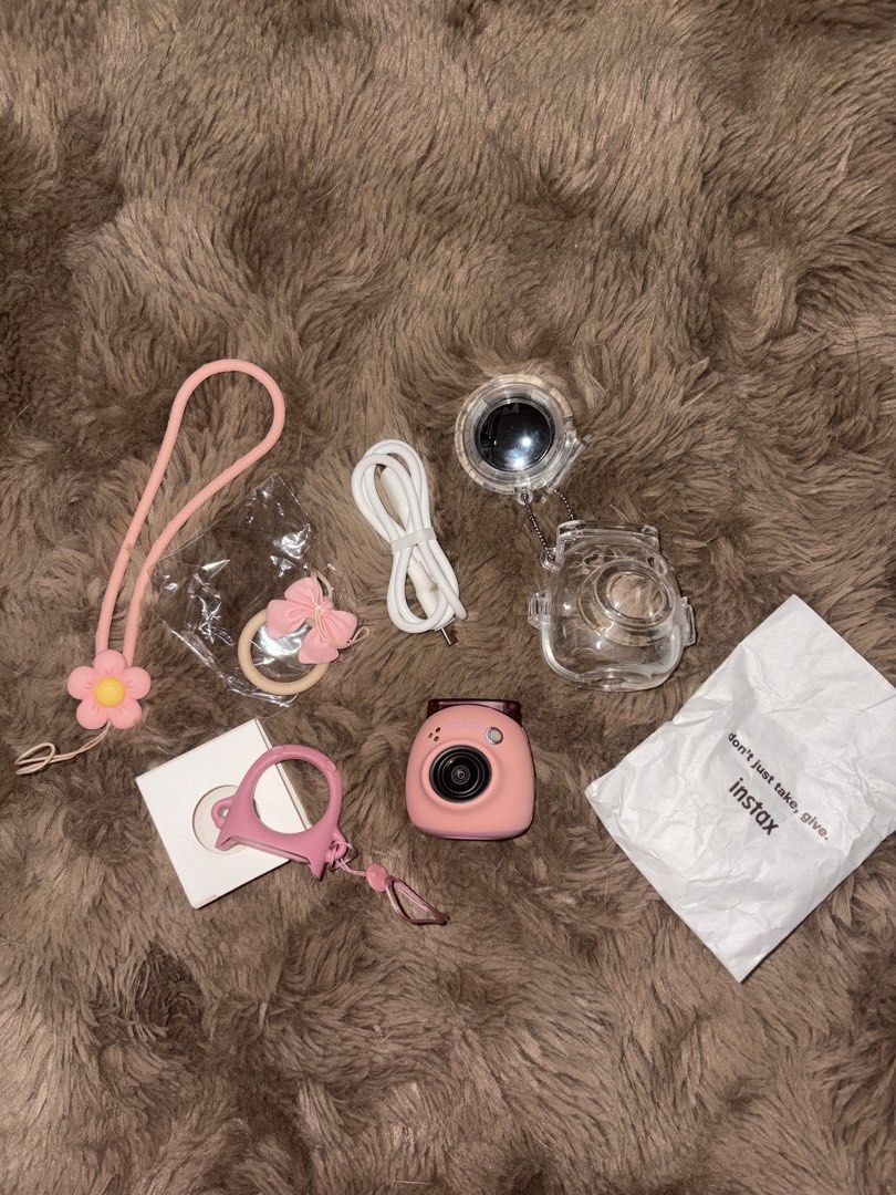 Fujifilm Instax PAL Digital Camera (Category: Cameras) located in Manila. Submitted by ryllae_ (Listing ID 1439131098, Image 2). Description: Fujifilm Instax PAL Digital Camera RFS: Barely used (3x only) - No issues, no hidden repairs - Personal use - Lady owned - No dents and scratches - Comes with accessories .