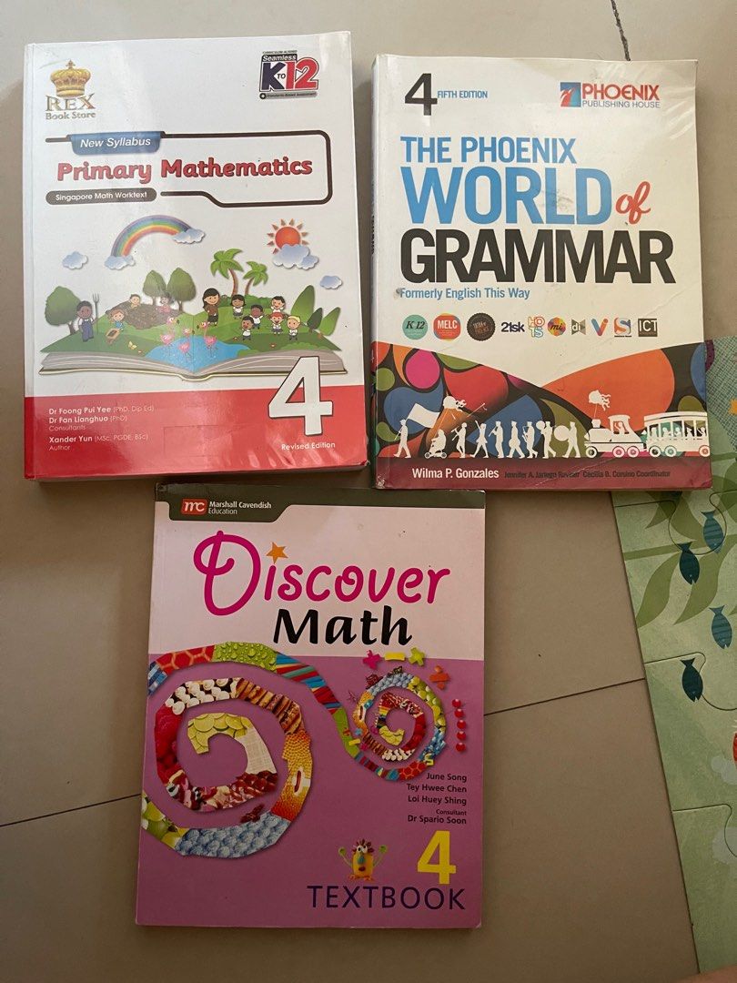 Grade 4 books (Category: Textbooks) located in Quezon City. Submitted by booktt (Listing ID 1439161505, Image 1). Description: 300 bundle Phoenix world of grammar -100 Primary Mathematics 4 (with some writings) 250 Discover Math Marshall Cavendish 4(no writings) 60.