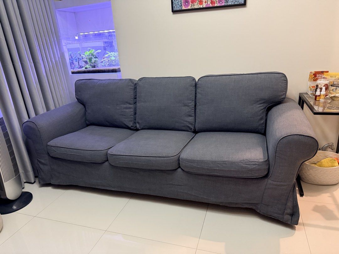 Gray 3-Seater Sofa (Category: Sofas) located in Taguig. Submitted by manilafortrealty.ph (Listing ID 1439138269, Image 3). Description: - 3-seater sofa - Neutral gray color - Classic design - Cushioned seats and armrests - Removable slipcover - Perfect for living rooms - Cozy and comfortable Bought 25k selling only 14K Reason to sell: I want new design sofa .