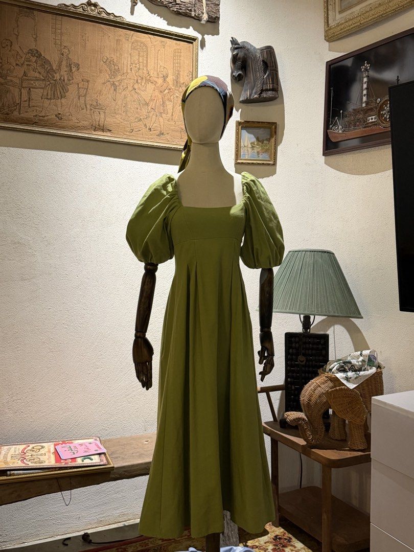 Green Puff Sleeve Dress (Category: Dresses) located in Manila. Submitted by vivstudio (Listing ID 1439134927, Image 1). Description: - Green dress - Square neckline - Puff sleeves - Fitted bodice - Flared skirt - Perfect for warm days.