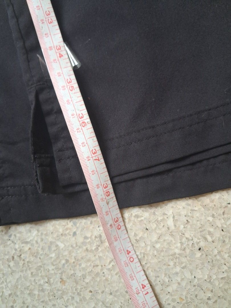 Grey's Anatomy Black Scrub Pants (Category: Other Bottoms) located in Manila. Submitted by beardedbot (Listing ID 1438914475, Image 3). Description: Black scrub pants from Grey's Anatomy. Features a drawstring waist. The pants appear to be made of a durable fabric. The pants are laid flat on a light blue surface. The Grey's Anatomy logo is visible on the waistband..