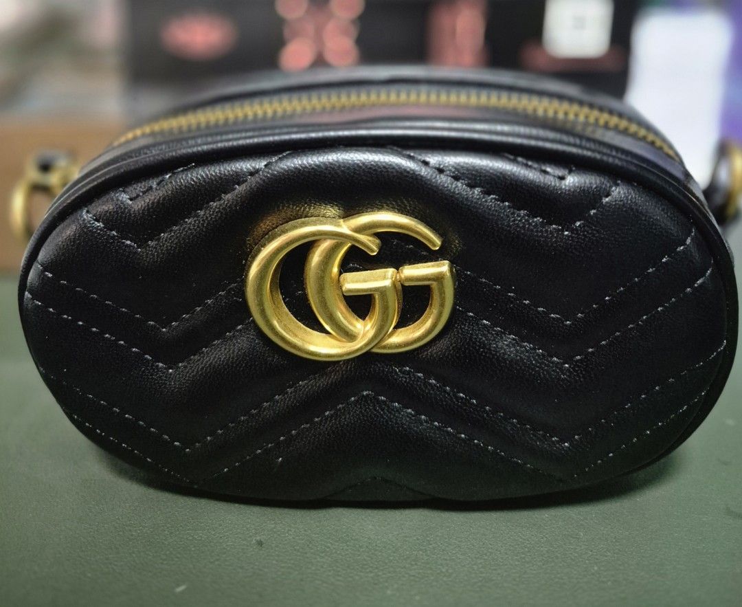 Gucci Crossbody Mini Bag (Category: Luxury Bags & Wallets) located in Manila. Submitted by sorayabarr50152 (Listing ID 1439075334, Image 2). Description: - premium Gucci GG Marmont Mini Bag - Black, quilted leather - Features the iconic GG logo.