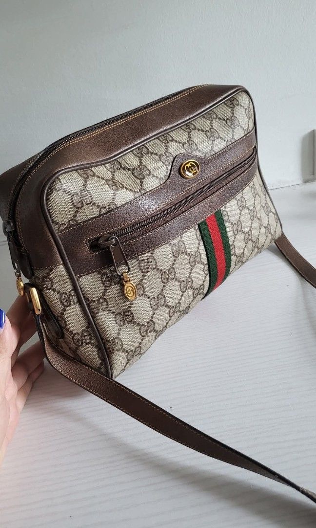 Gucci sherryline sling bag (Category: Luxury Bags & Wallets) located in Manila. Submitted by junri0 (Listing ID 1439129990, Image 3). Description: Vintage Gucci Sherryline Sling Bag Excellent Condition🥰 Medium size 10 x 7 inches 💯Authentic from Japan There's a re edition of that bag Pvc Leather Issue:nag start na sya magpowderized sa ilalim ng zip over all maganda pa 🩵 Kindly keep in mind that most of the bags we offer are vintage or pre-owned