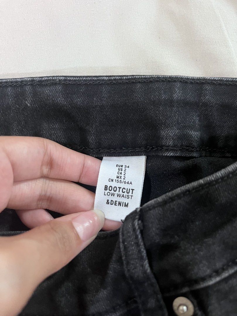 H&M Bootcut Low Waist Jeans (Category: Jeans) located in Quezon City. Submitted by alex_declutter (Listing ID 1439102997, Image 2). Description: - H&M black bootcut jeans - Low waist - Classic five-pocket design - Size: EUR 34, US 2, CA 2 - Straight leg opening - Perfect for everyday use RFS: Too small.