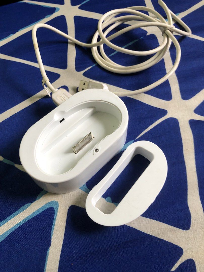 Ipod mini cradle dock (Category: Portable Audio Accessories) located in Quezon City. Submitted by markgolveo (Listing ID 1439083192, Image 1). Description: Tested working properly With audio out jack at back.