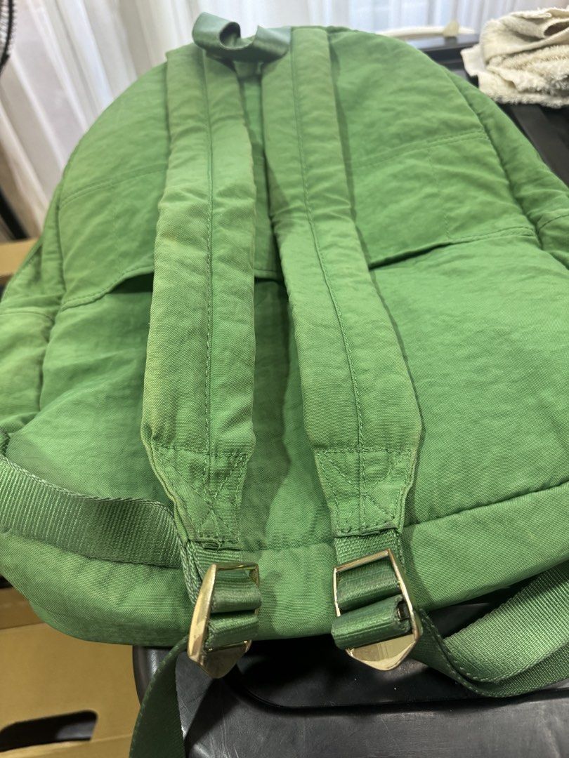Kipling Green Backpack (Category: Backpacks) located in Quezon City. Submitted by madampat (Listing ID 1439165820, Image 3). Description: - Green Kipling backpack - Multiple zippered compartments - Top handle - Adjustable shoulder straps - Light beige interior - Small interior pocket - Gold-finished zippers - Kipling logo on front.