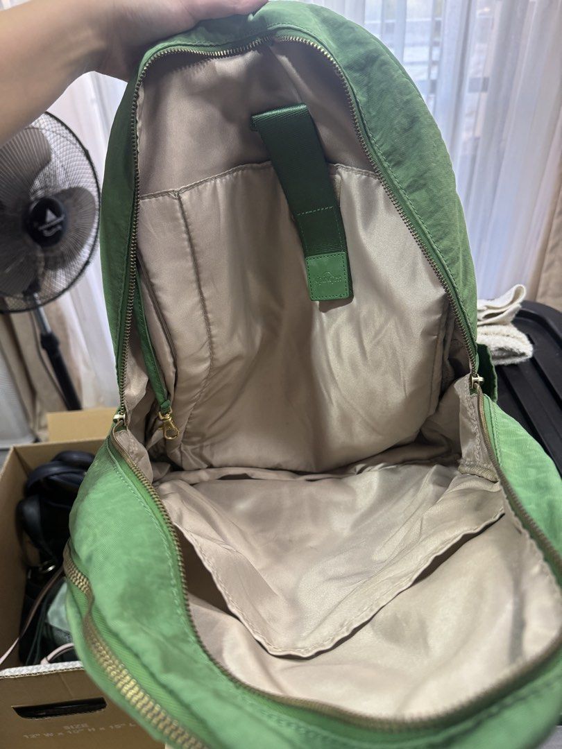 Kipling Green Backpack (Category: Backpacks) located in Quezon City. Submitted by madampat (Listing ID 1439165820, Image 2). Description: - Green Kipling backpack - Multiple zippered compartments - Top handle - Adjustable shoulder straps - Light beige interior - Small interior pocket - Gold-finished zippers - Kipling logo on front.