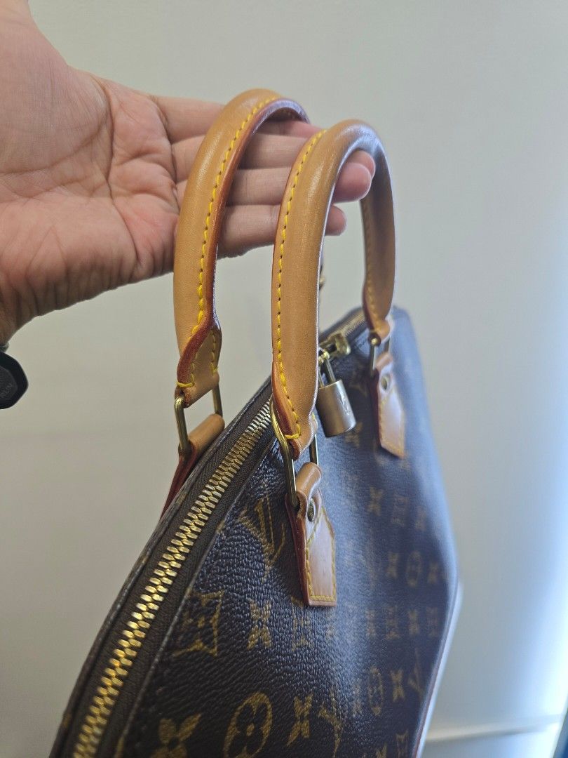 Louis Vuitton Alma PM Monogram Coated Canvas Bag (Category: Luxury Bags & Wallets) located in Taguig. Submitted by mluxeph (Listing ID 1439076596, Image 2). Description: Louis Vuitton Alma PM Monogram Coated Canvas Bag Material: Coated canvas and cowhide leather Stamp: BA0977 Year: 1997 Interior: One main compartment and one open pocket Measurements: 12.6"L X 6.3"W X 9.8"H Handle Drop: 3.6" Hardware: Gold tone Inclusions: Original dust bag and pa