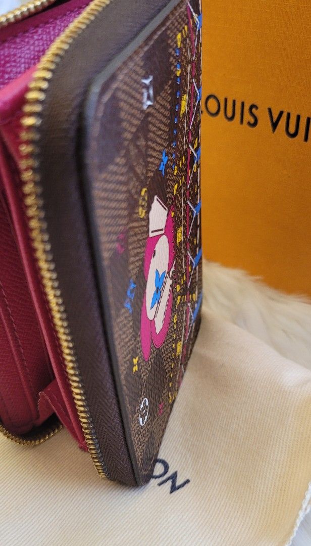 Louis Vuitton Compact Zip Vivienne (Category: Luxury Bags & Wallets) located in Quezon City. Submitted by bagsplusmore (Listing ID 1439248525, Image 2). Description: - Authentic Louis Vuitton zip wallet - Iconic Damier Ebene canvas - vivienne collection - Vibrant pink interior - Includes original box and dust bag - Multiple card and cash compartments .