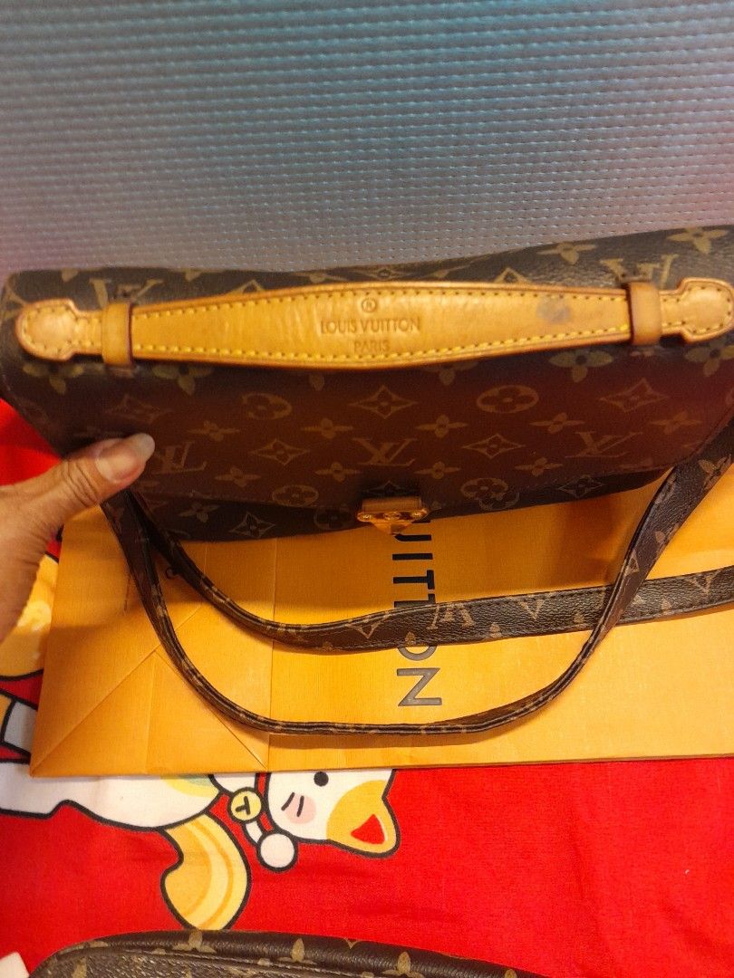 Louis Vuitton Monogram Crossbody Bag (Category: Bags & Wallets) located in Singapore. Submitted by vastcloud_ea17aa (Listing ID 1439098259, Image 2). Description: Louis Vuitton crossbody bag - Classic monogram canvas - Gold-tone clasp closure - Detachable shoulder strap - Top handle - Includes original shopping bag - Perfect for everyday use.