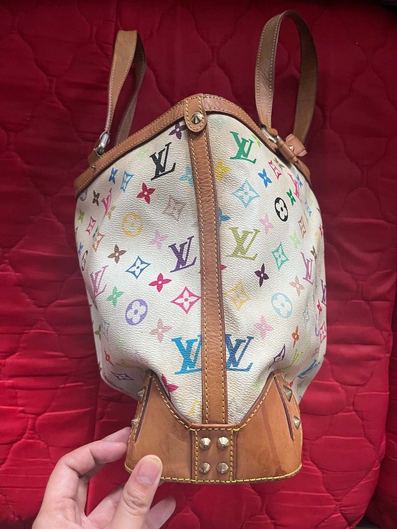 Louis Vuitton Multicolor Tote Bag (Category: Luxury Bags & Wallets) located in Cabanatuan. Submitted by chinithou (Listing ID 1439135532, Image 2). Description: - Louis Vuitton tote bag - Multicolor design - Leather handles and trim - Zippered closure - Spacious interior - Iconic LV monogram pattern - Metal studs on the base.