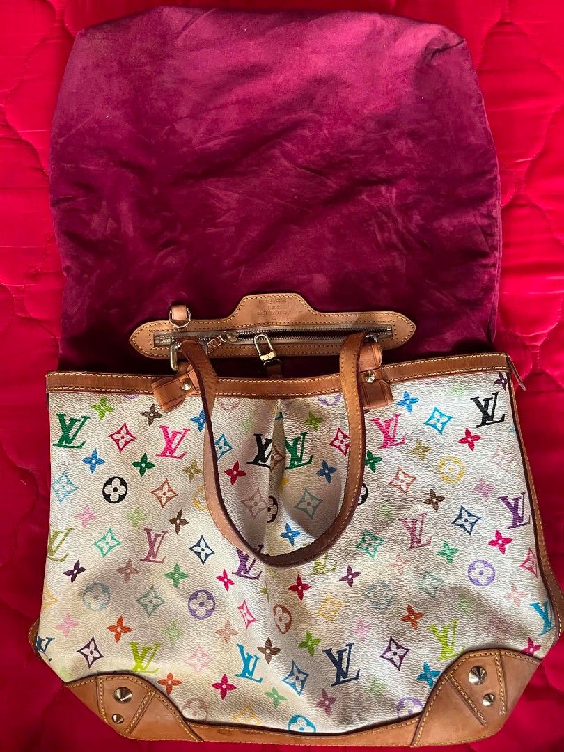 Louis Vuitton Multicolor Tote Bag (Category: Luxury Bags & Wallets) located in Cabanatuan. Submitted by chinithou (Listing ID 1439135532, Image 3). Description: - Louis Vuitton tote bag - Multicolor design - Leather handles and trim - Zippered closure - Spacious interior - Iconic LV monogram pattern - Metal studs on the base.