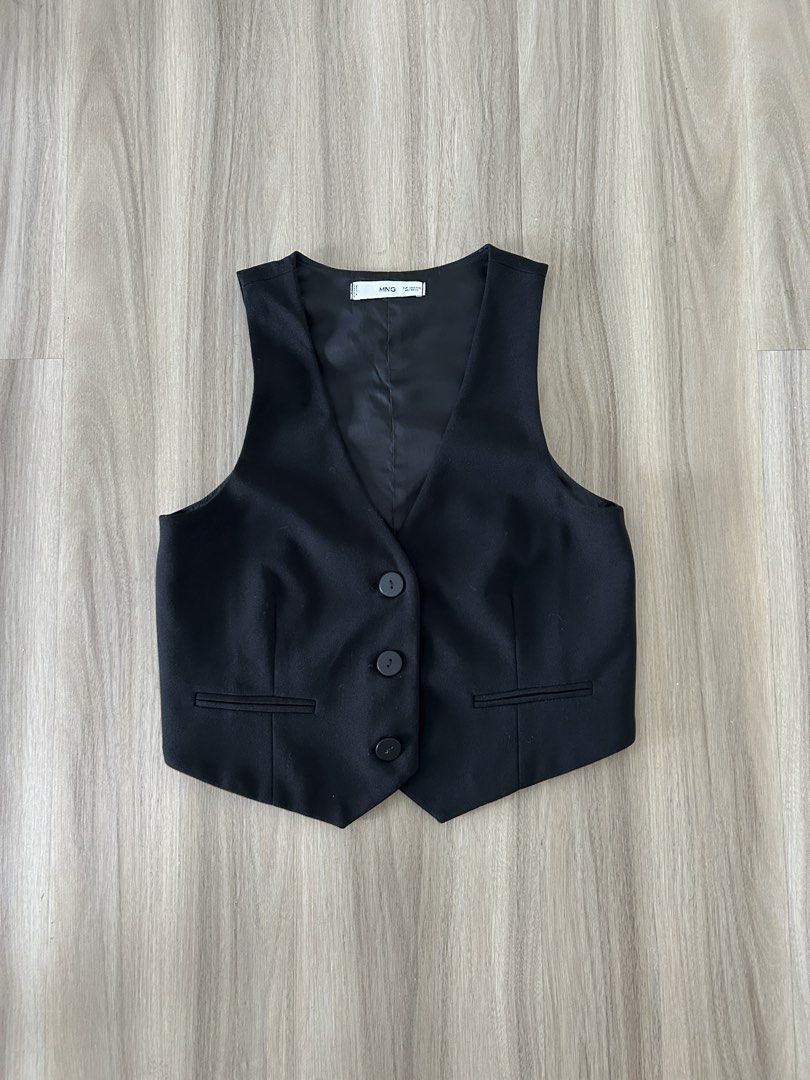 Mango Black Vest/Waistcoat Top (Category: Sleeveless) located in Taguig. Submitted by prelovedcloset2 (Listing ID 1439188278, Image 1). Description: - Mango black vest - V-neck design - Three-button closure.