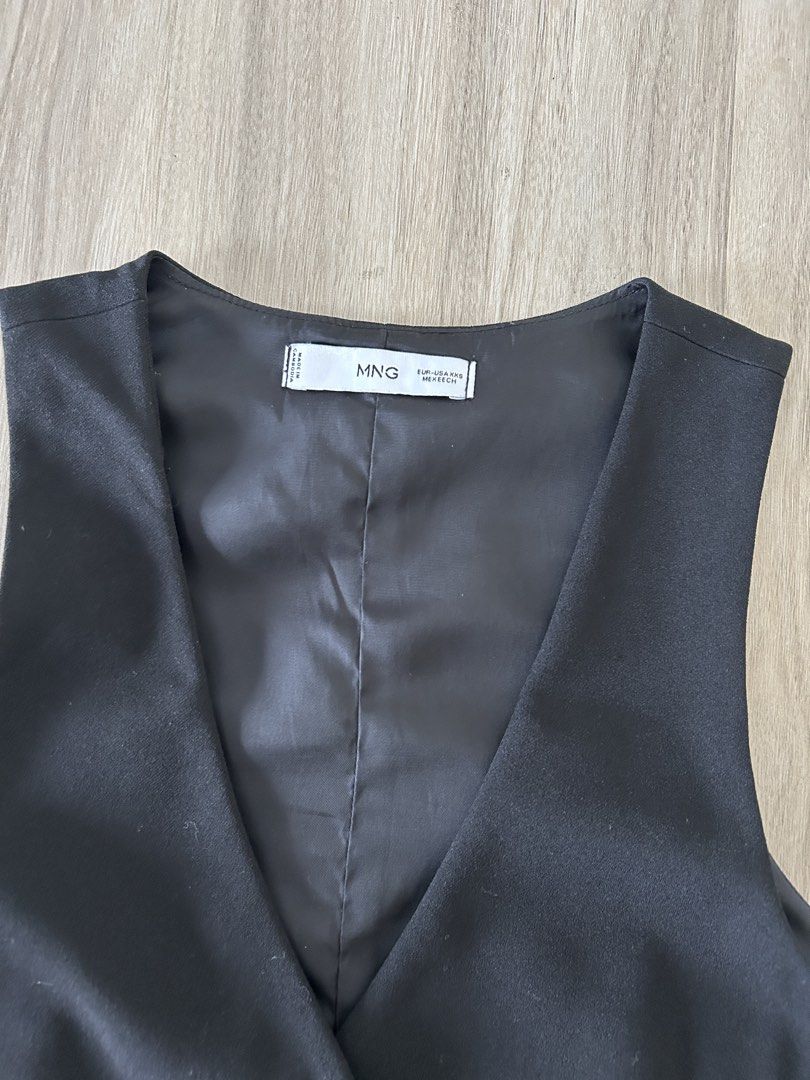 Mango Black Vest/Waistcoat Top (Category: Sleeveless) located in Taguig. Submitted by prelovedcloset2 (Listing ID 1439188278, Image 3). Description: - Mango black vest - V-neck design - Three-button closure.