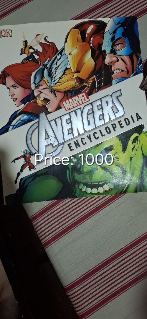 Marvel Avengers Encyclopedia (Category: Children's Books) located in Manila. Submitted by zozosells (Listing ID 1439189017, Image 1). Description: - Marvel Avengers Encyclopedia - Features various Avengers characters - Price: ₱1000 - Perfect for Marvel fans and collectors - Great addition to any comic book collection.