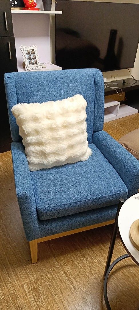 Modern Armchair - Orange and Blue (Category: Chairs) located in Pasig City. Submitted by kimjose (Listing ID 1439242030, Image 2). Description: - Stylish armchairs available in orange and blue - Comfortable seat and backrest - Features wooden legs - Perfect for living rooms or bedrooms - Includes cushions - Orange chair has a gray cushion - Blue chair has a white cushion.