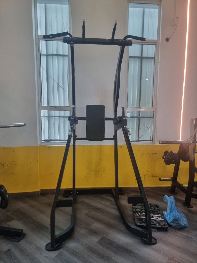 Multi-Function Dip Station (Category: Weights & Dumbells) located in Kuala Lumpur. Submitted by ixchang9372046 (Listing ID 1439150531, Image 1). Description: - Multi-function dip station for home gym. - Features pull-up bar, dip bars, and backrest. - Sturdy frame for stability. - Perfect for building upper body strength. - Suitable for dips, pull-ups, and leg raises. - Comfortable and effective for various exercises..
