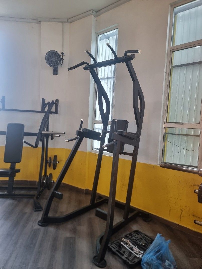 Multi-Function Dip Station (Category: Weights & Dumbells) located in Kuala Lumpur. Submitted by ixchang9372046 (Listing ID 1439150531, Image 2). Description: - Multi-function dip station for home gym. - Features pull-up bar, dip bars, and backrest. - Sturdy frame for stability. - Perfect for building upper body strength. - Suitable for dips, pull-ups, and leg raises. - Comfortable and effective for various exercises..