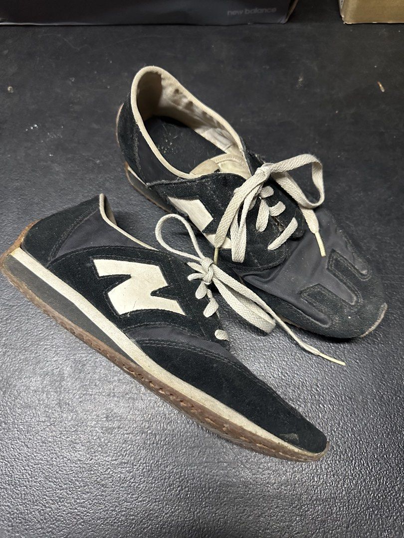 New Balance U320AC Sneakers (Category: Sneakers) located in Quezon City. Submitted by plzdeclutter (Listing ID 1439217802, Image 2). Description: - Vintage New Balance U320AC sneakers - Size: US 5 - Black suede and nylon upper - White "N" logo - Classic retro design - No issue just needs cleaning.