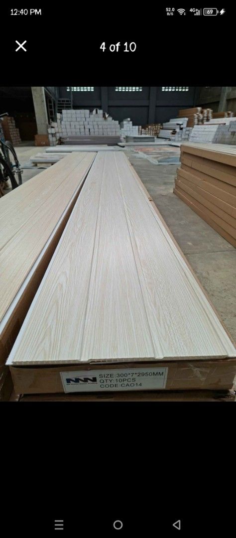 NNN PVC Panel - Wood Grain Design (Category: Construction & Building Materials) located in Manila. Submitted by rowenavale01715 (Listing ID 1439230828, Image 1). Description: - New PVC wood grain panels - Available colors: Light wood, Reddish-brown - Dimensions: 300mm x 2200mm - Perfect for interior walls and ceilings - Easy to install and maintain - Durable and water-resistant.