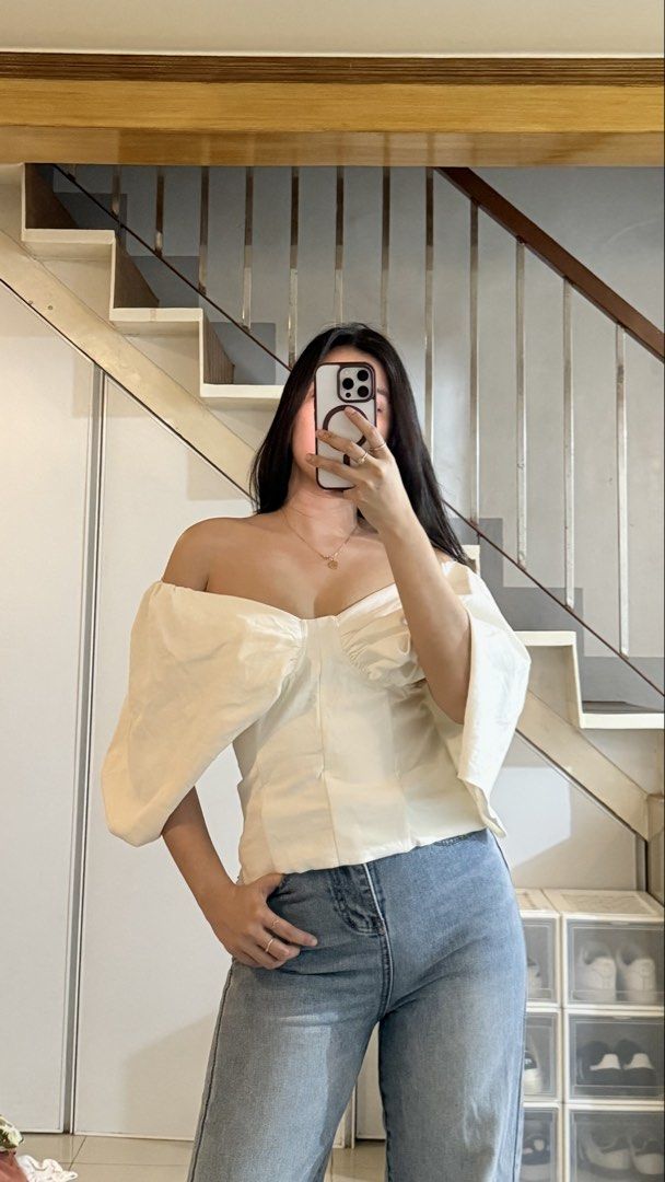 Off-Shoulder Puff Sleeve Top (Category: Blouses) located in Santa Rosa. Submitted by jnicamaermos (Listing ID 1439092705, Image 1). Description: - Cream-colored off-shoulder top - Features puff sleeves - Sweetheart neckline - Fitted bodice - Made of a smooth fabric - Pairs well with denim jeans - Simple necklace included.