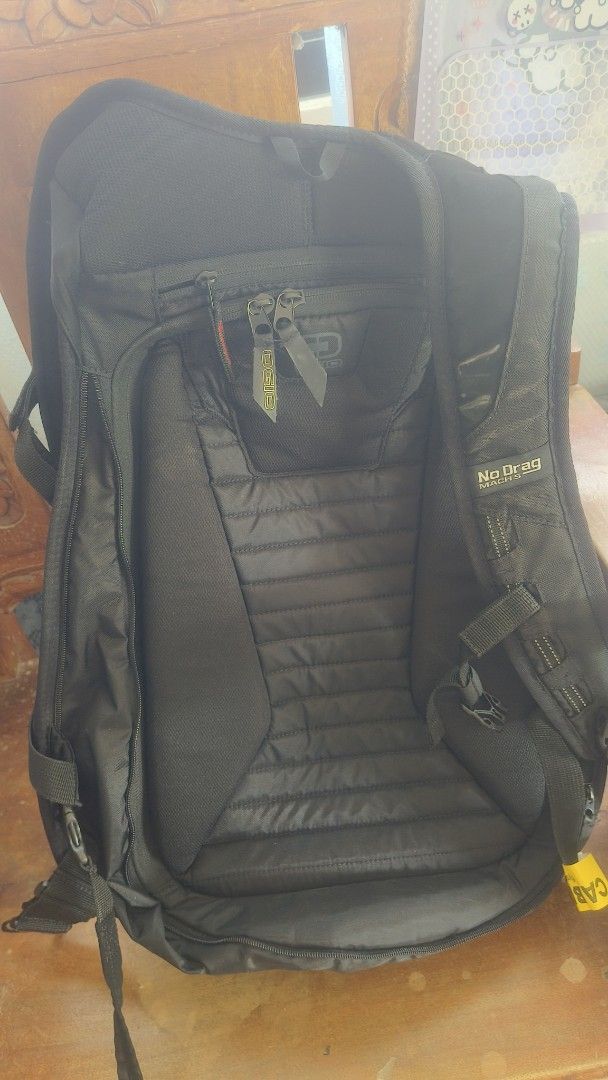 OGIO Backpack (Category: Backpacks) located in Tarlac. Submitted by its_jess (Listing ID 1439090811, Image 2). Description: - OGIO black backpack (from Australia) - Padded back panel for comfort - Adjustable shoulder straps - Multiple compartments for storage - Top handle for easy carrying - Features the OGIO logo.