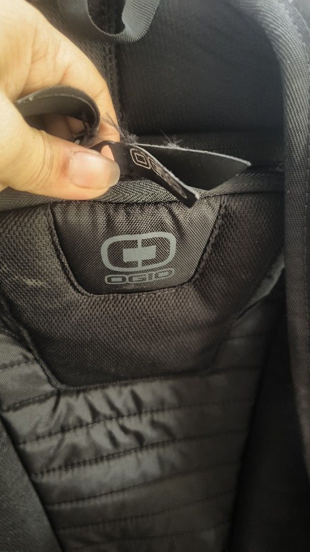 OGIO Backpack (Category: Backpacks) located in Tarlac. Submitted by its_jess (Listing ID 1439090811, Image 3). Description: - OGIO black backpack (from Australia) - Padded back panel for comfort - Adjustable shoulder straps - Multiple compartments for storage - Top handle for easy carrying - Features the OGIO logo.