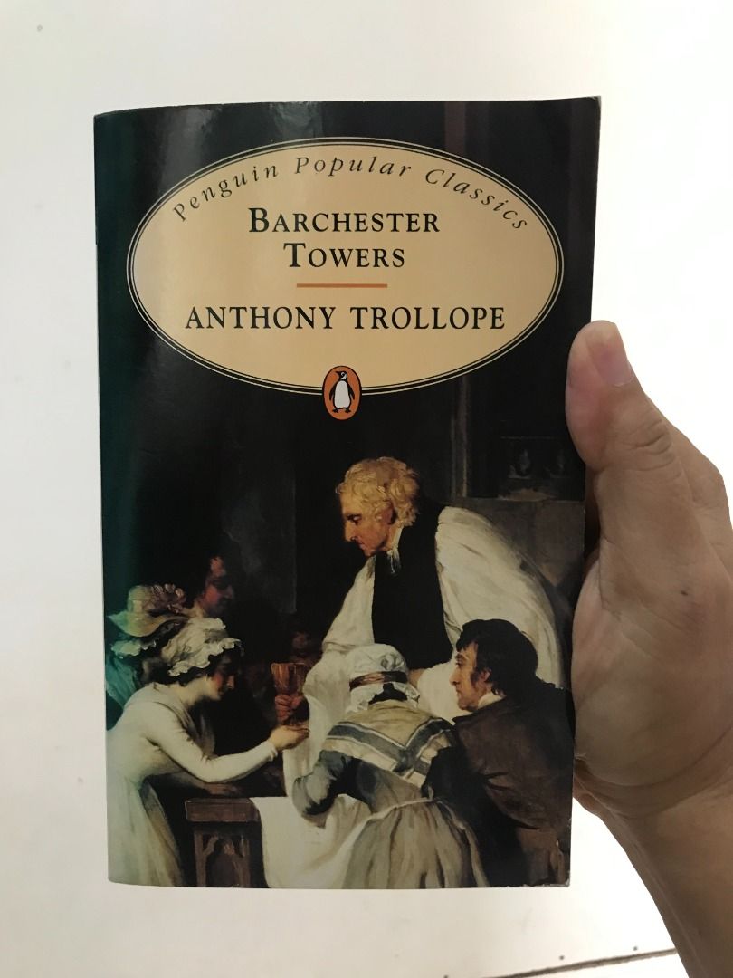 Penguin Popular Classics Barchester Towers (Category: Storybooks) located in Dumarao. Submitted by mellowbabe23 (Listing ID 1439129416, Image 1). Description: - Anthony Trollope's 'Barchester Towers' - Penguin Popular Classics edition - Cover art: Painting of a gathering - Physical book (held in hand) - Title and author clearly visible.
