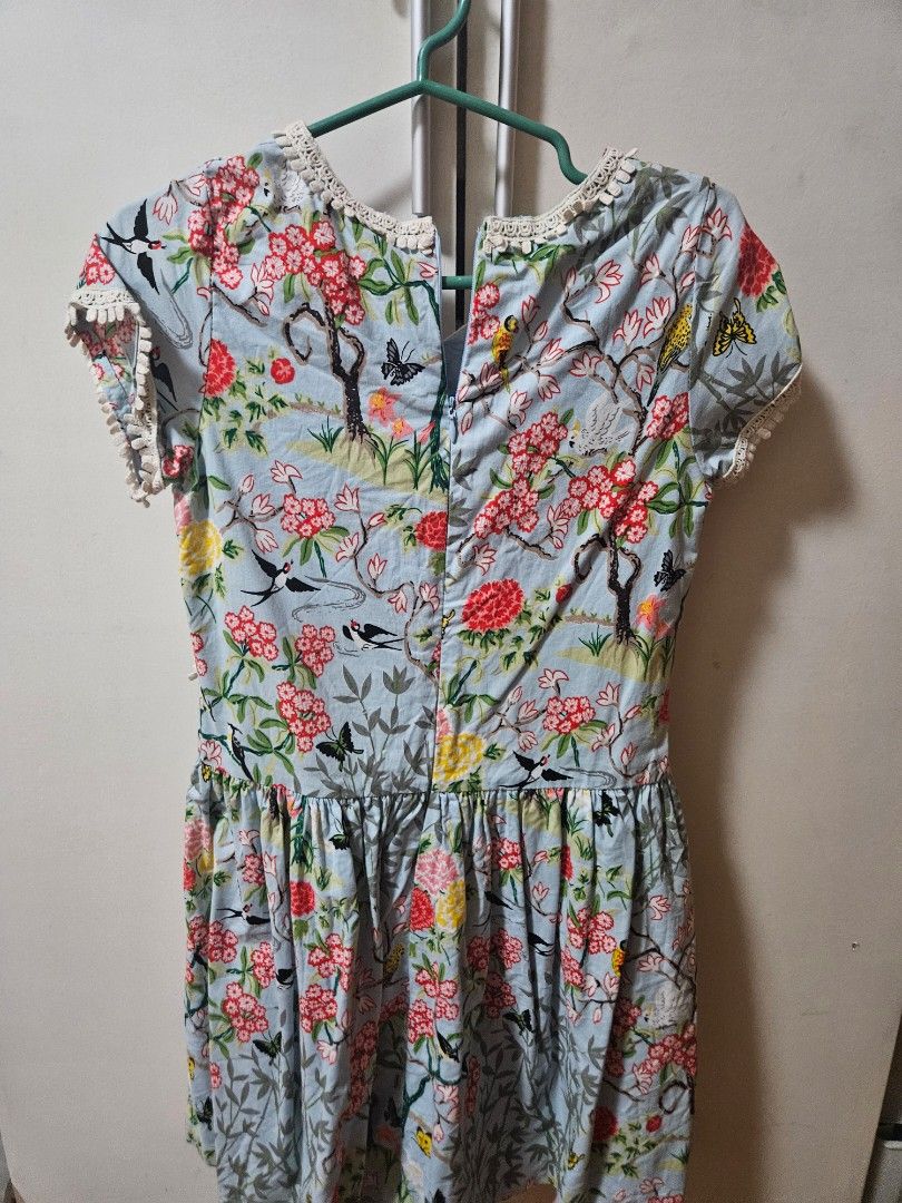 Peppermint 14 Dress Floral Print (Category: Babies & Kids Fashion) located in Manila. Submitted by annmd (Listing ID 1439105809, Image 2). Description: - Peppermint 14 dress - Floral print - Light blue background - V-neck with white lace trim - Short sleeves - Gathered waist - Perfect for casual wear - worn at 8-9 years old.