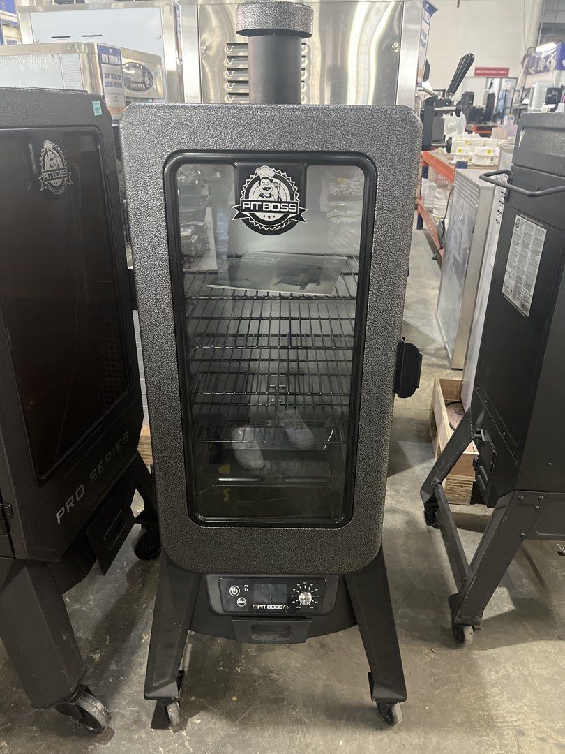 Pit Boss Vertical Wood Pellet Smoker (Category: Cookware & Accessories) located in Manila. Submitted by prittielei (Listing ID 1439070988, Image 1). Description: - Pit Boss vertical wood pellet smoker - Multiple racks for smoking - Digital control panel - Includes owner's manual - Black exterior with glass viewing window.