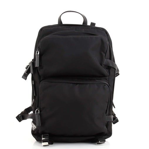 Prada Black Nylon Backpack (Category: Luxury Bags & Wallets) located in Pasig City. Submitted by yoyosstore (Listing ID 1439077136, Image 1). Description: - Authentic Prada backpack - Multiple compartments for storage - Top handle and adjustable straps - Prada logo on the side and inside - Interior zippered pocket - Buckle closures on sides and bottom - Minor wear on handle due to storage - No tear or damage. Very good condition, RFS decluttering