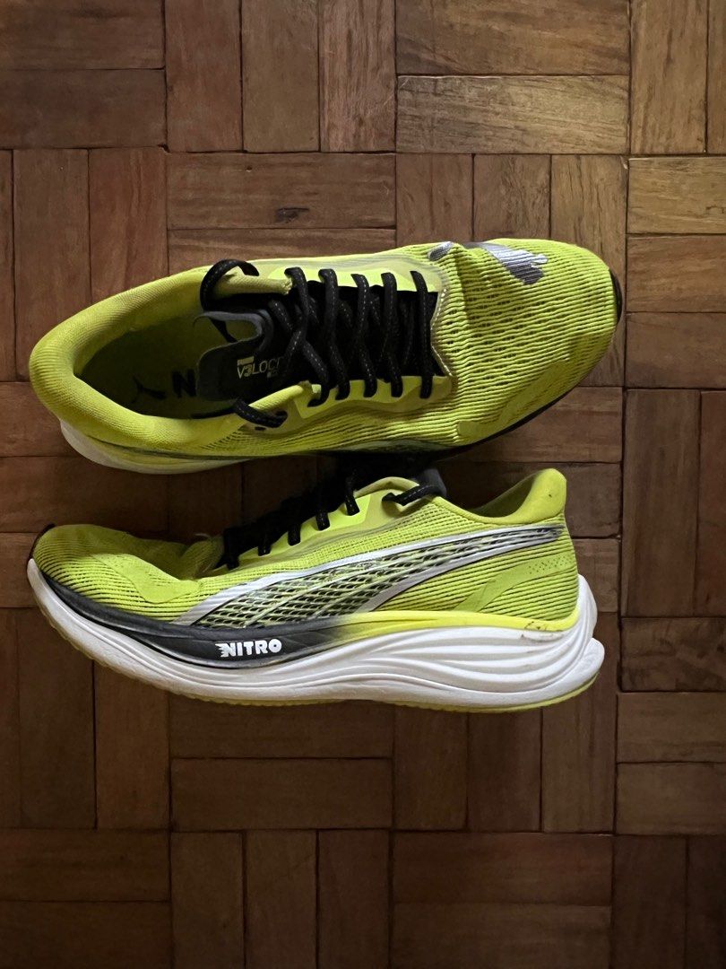 Puma Velocity Nitro Running Shoes (Category: Sneakers) located in Bacolod City. Submitted by chikiverd (Listing ID 1439248495, Image 2). Description: - Puma Velocity Nitro running shoes - Eye-catching yellow color - Size: UK 8.5, EUR 42.5, US 9.5, 27.5 cm - Black laces - White and black sole - Puma logo on the side - Made in China - well used, signs of wear and tear - no box.