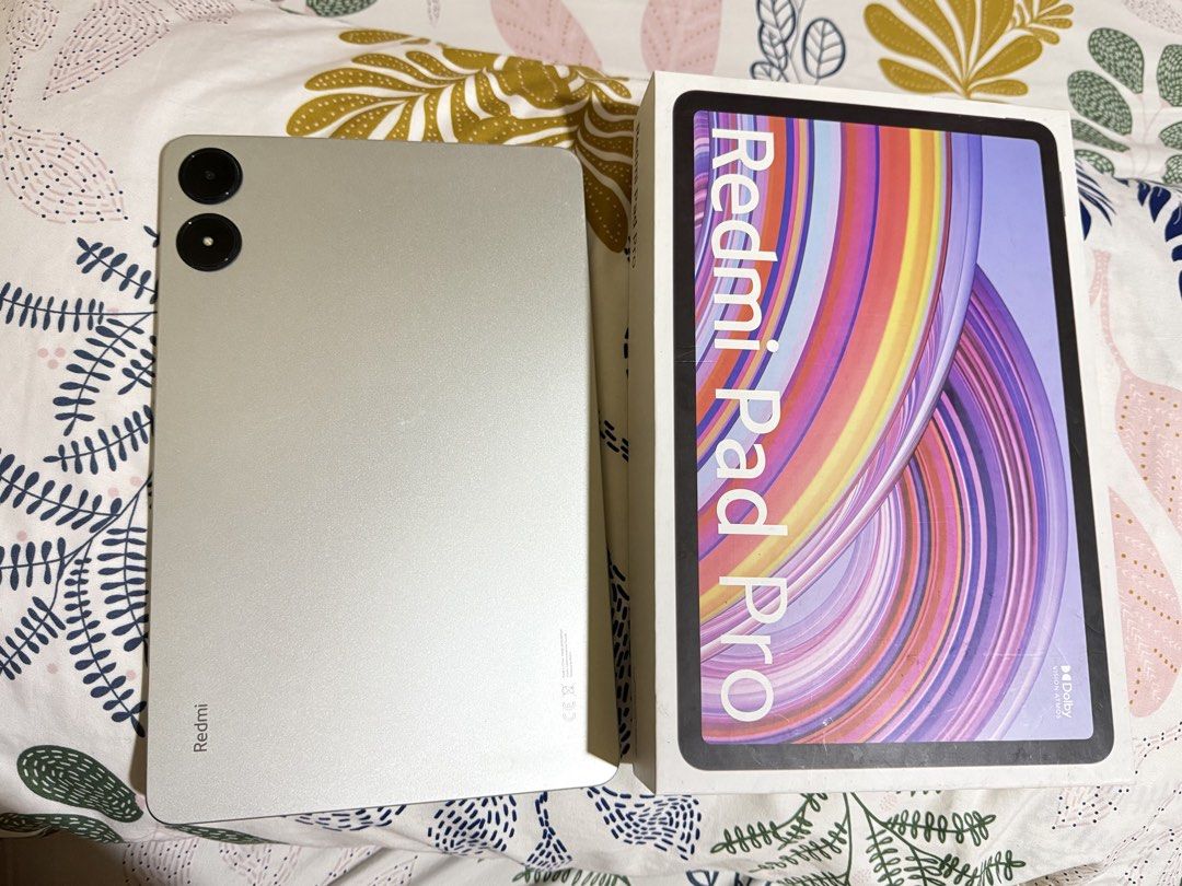 Redmi Pad Pro (Silver) - FOR SALE (Category: Android) located in Manila. Submitted by _imangeladatu23 (Listing ID 1439176260, Image 2). Description: Redmi Pad Pro (Silver) Bought it for ₱12,999 in the mall Good as new 128gb storage RFS: Bought a new one & not frequently using it anymore Inclusions: Box, charger, and clear case Meet up: around Manila, San Juan and Mandaluyong only.