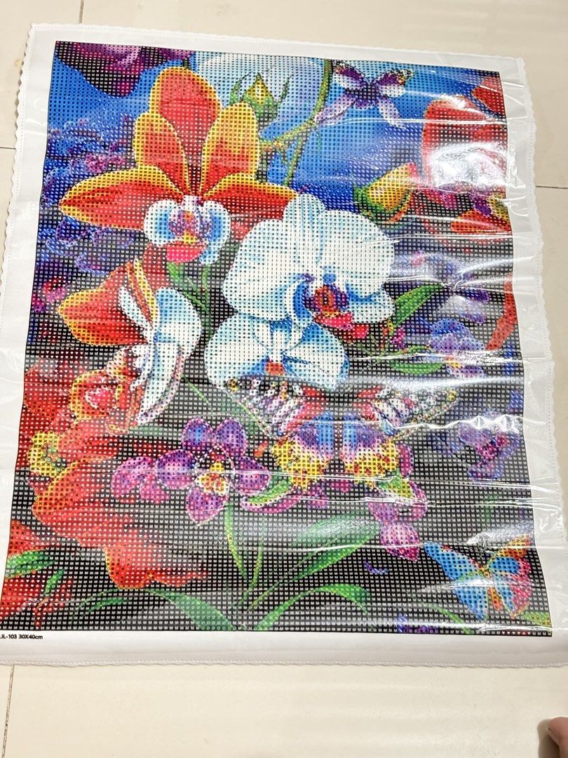 Resin Reign Diamond Painting Kit (Category: Art & Prints) located in Taguig. Submitted by ellies_basket (Listing ID 1439086877, Image 2). Description: - Resin Reign Incognito 22 Diamond Painting Kit - Artwork: Floral design with orchids and butterflies - Artist: Akosi Jang - Shape: Round - Size: 30x40cm - Includes: Canvas, resin diamonds, color chart.