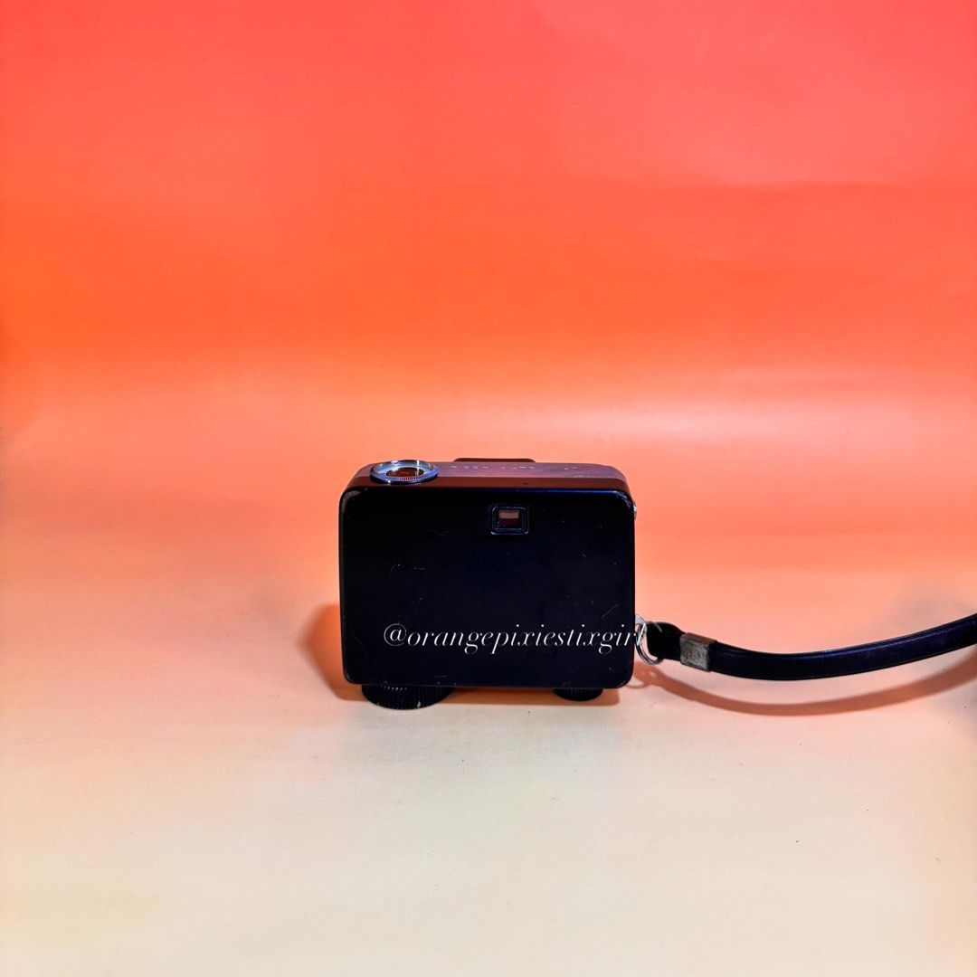 Ricoh Auto Half 35mm Half Frame Film Camera (Category: Cameras) located in Bulacan. Submitted by orangepixiestixgirl (Listing ID 1426267823, Image 2). Description: ‼️message me on ig, @orangepixiestixgirl for inquiries and transactions‼️ ‼️ CAN’T REPLY HERE ‼️ Ricoh Auto Half 35mm Half Frame Film Camera —half-frame camera, takes 72 pictures on a standard 36-exposure roll of 35mm film. —equipped with a fixed 25mm f/2.8 lens. —uses a selenium light