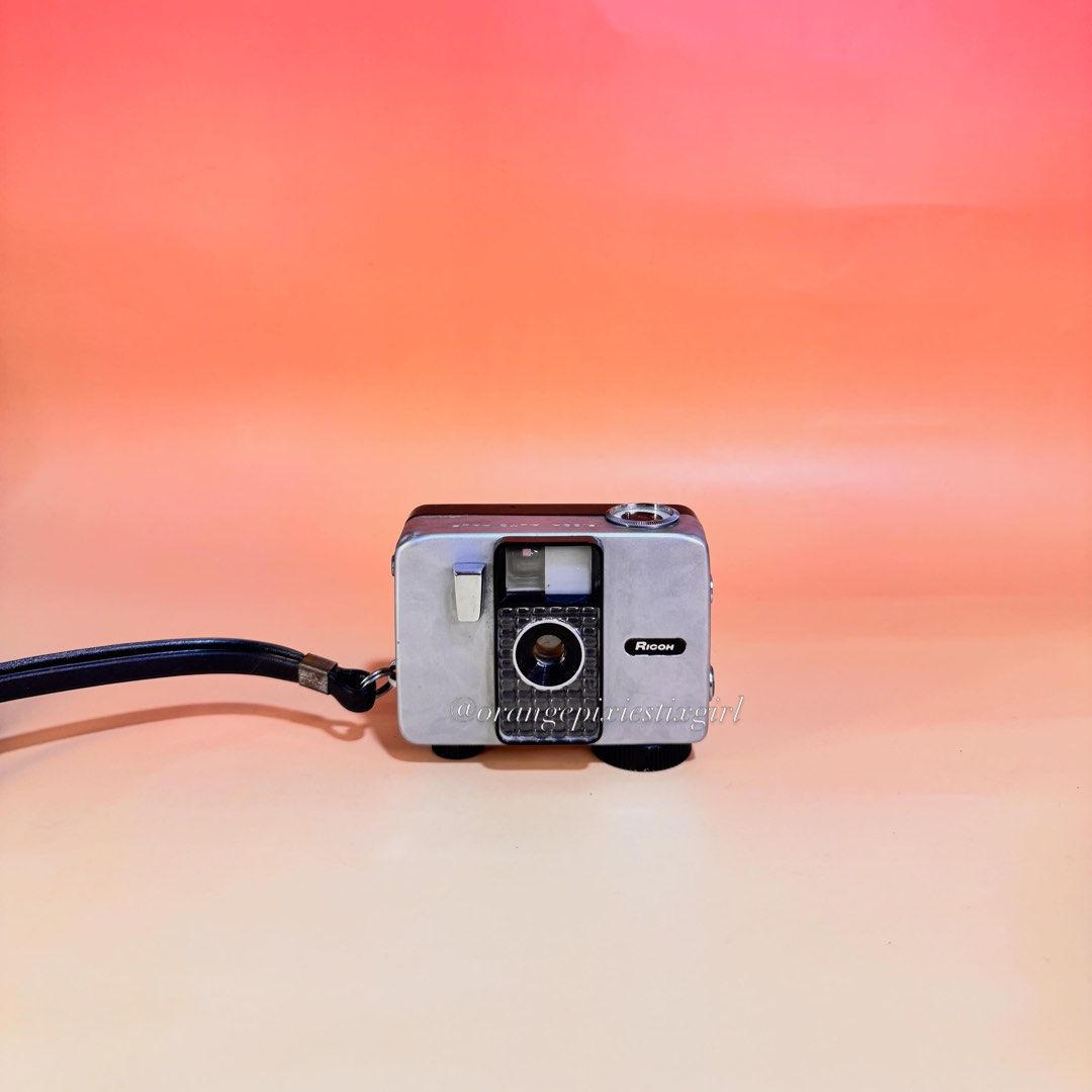 Ricoh Auto Half 35mm Half Frame Film Camera (Category: Cameras) located in Bulacan. Submitted by orangepixiestixgirl (Listing ID 1426267823, Image 1). Description: ‼️message me on ig, @orangepixiestixgirl for inquiries and transactions‼️ ‼️ CAN’T REPLY HERE ‼️ Ricoh Auto Half 35mm Half Frame Film Camera —half-frame camera, takes 72 pictures on a standard 36-exposure roll of 35mm film. —equipped with a fixed 25mm f/2.8 lens. —uses a selenium light