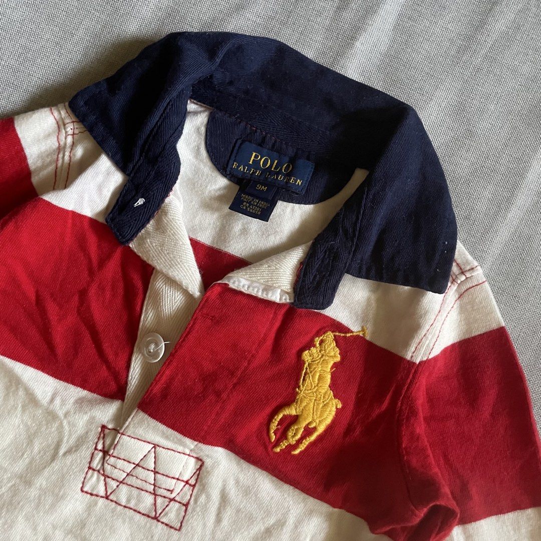 RL long-sleeved rugby shirt (Category: Babies & Kids Fashion) located in Don Carlos. Submitted by vianjn (Listing ID 1439077595, Image 2). Description: Polo Ralph Lauren long-sleeved red and white striped rugby shirt featuring a prominent yellow embroidered polo player logo..