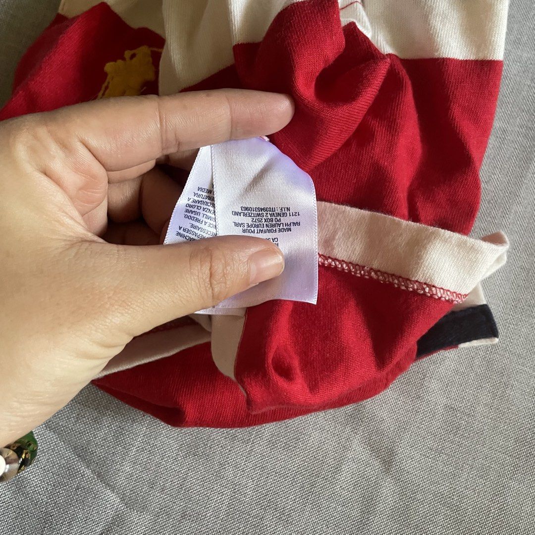 RL long-sleeved rugby shirt (Category: Babies & Kids Fashion) located in Don Carlos. Submitted by vianjn (Listing ID 1439077595, Image 3). Description: Polo Ralph Lauren long-sleeved red and white striped rugby shirt featuring a prominent yellow embroidered polo player logo..