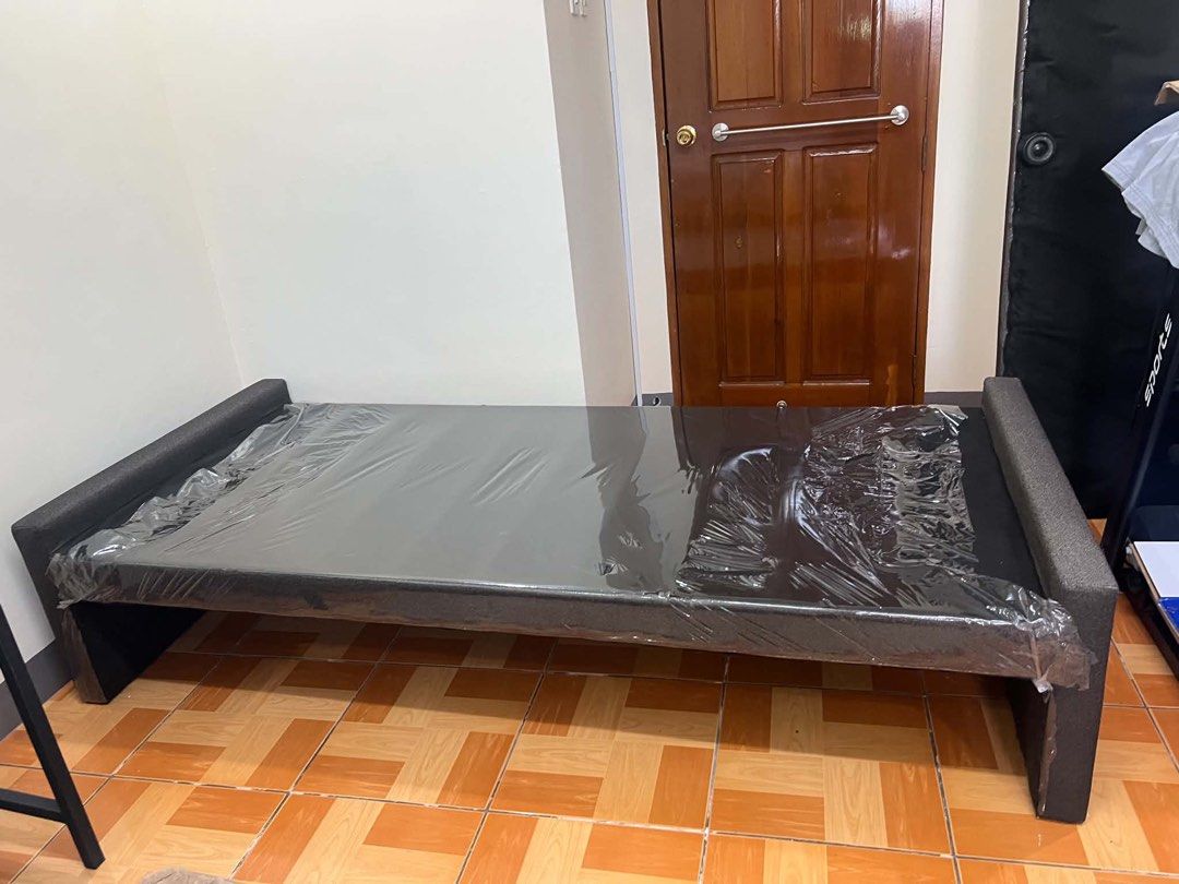Salem Bed Frame (Single) with pullout (Category: Bed Frames & Mattresses) located in Manila. Submitted by eunicefaye (Listing ID 1439174056, Image 3). Description: Salem Bed Frame (Single)🛏️ - With pullout bed base - Model: Osmond - Size: 36” x 75” x 12” - Color: Dark gray - Condition: Used (with plastic in some areas) 🏷️Php 8,000 only (Retails in store for Php 13,995. Save Php 5,995) Pick up Location: Sampaloc, Manila (near NU Nazareth).