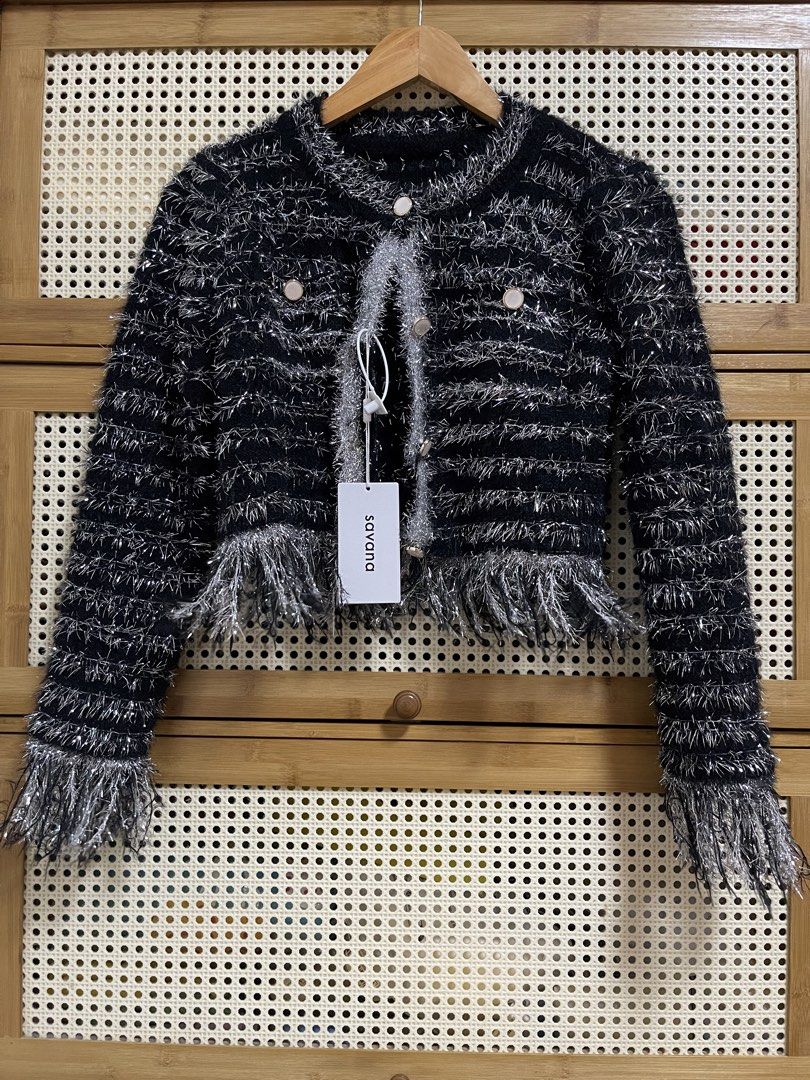 Savana Black and Silver Fringe Jacket (Category: Coats, Jackets and Outerwear) located in Arayat. Submitted by prettyquen (Listing ID 1439114894, Image 2). Description: - Savana jacket - Black and silver textured design - Fringe detailing - Round neckline - Gold-toned button closure - Long sleeves - Cropped length - New with Savana tag.