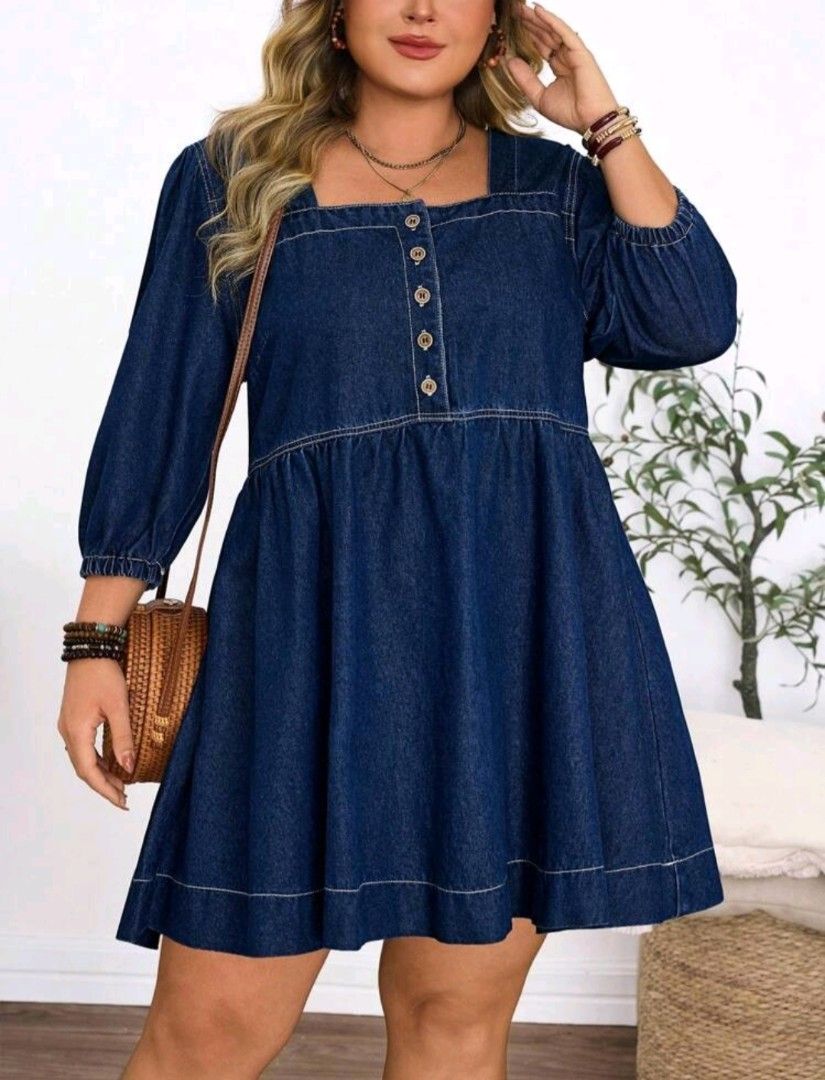 SHEIN Plus Size Denim Midi Dress (Category: Dresses) located in Los Banos. Submitted by jazzandjacob14 (Listing ID 1439157050, Image 1). Description: Navy denim midi dress. Features a square neckline, long sleeves, and flared hem. Button-up front with white stitching. Plus size. 0xl on tag but can fit to 1xl.