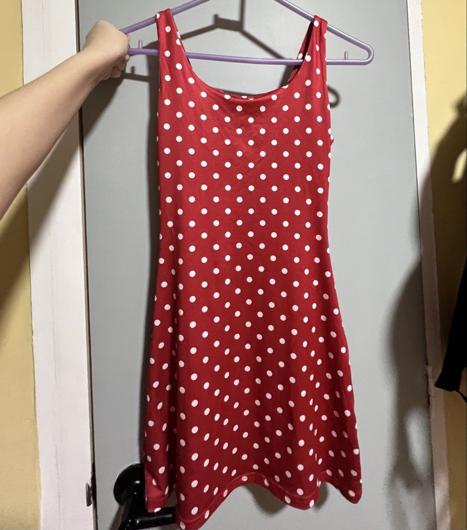Shein Red Polka Dot Dress (Category: Dresses) located in Muntinlupa City. Submitted by sunwonx (Listing ID 1439184954, Image 2). Description: - Red dress with white polka dots - Sleeveless design - Features a tie-up detail - Scoop back - Bodycon style.