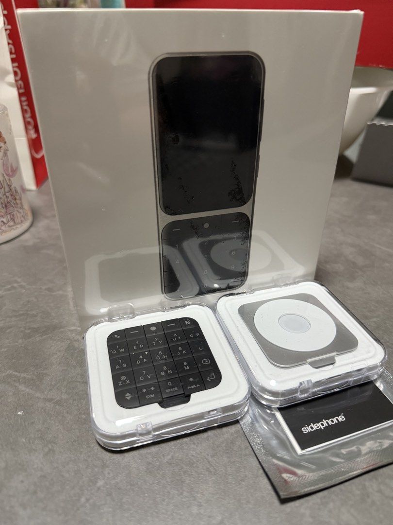 Sidephone SP-01 Founders Edition (Category: Android Others) located in Quezon City. Submitted by --ro-- (Listing ID 1439212799, Image 1). Description: Sidephone SP-01 Founders Edition w/ Compact QWERTY and Sundial Keypad A modern simple phone. Sidephone is a feature phone that runs a growing selection of apps and utilities. Shifts into shape. Sidephone is the world’s first mobile phone with a swappable USB keypad. A premium dumbphone with high qu
